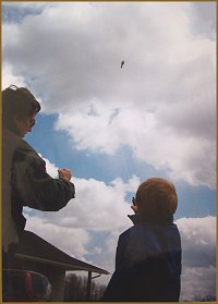 Pete Quaife and Nikita Babailov, flying a kite